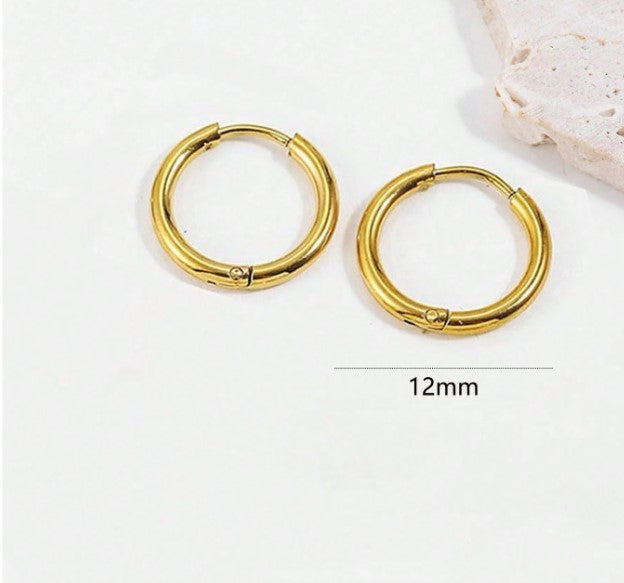 Two gold hoop earrings shown on a white background with a small decorative stone and a 12mm size marker below them.