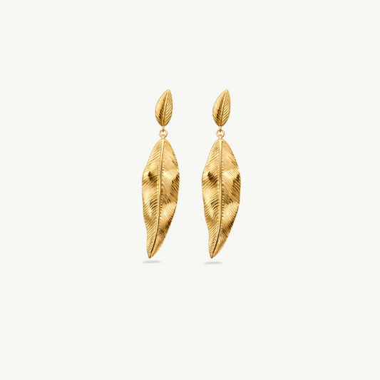 A pair of ice cream cone stud earrings with pink faceted gemstones and silver-toned metal settings, shown on a clean off-white background.