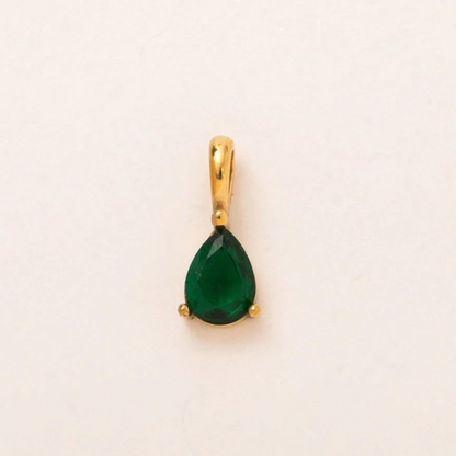 Gold and diamond baby pendant on a white background